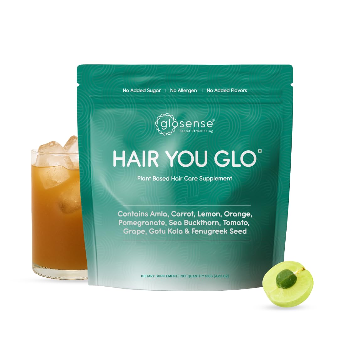 Glosense Hair You Glo hair care supplement package with a glass of iced tea and a green fruit on a white background