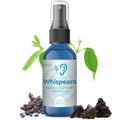 Blue bottle of Whispeara hearing support formula with leaves and herbs on a white background
