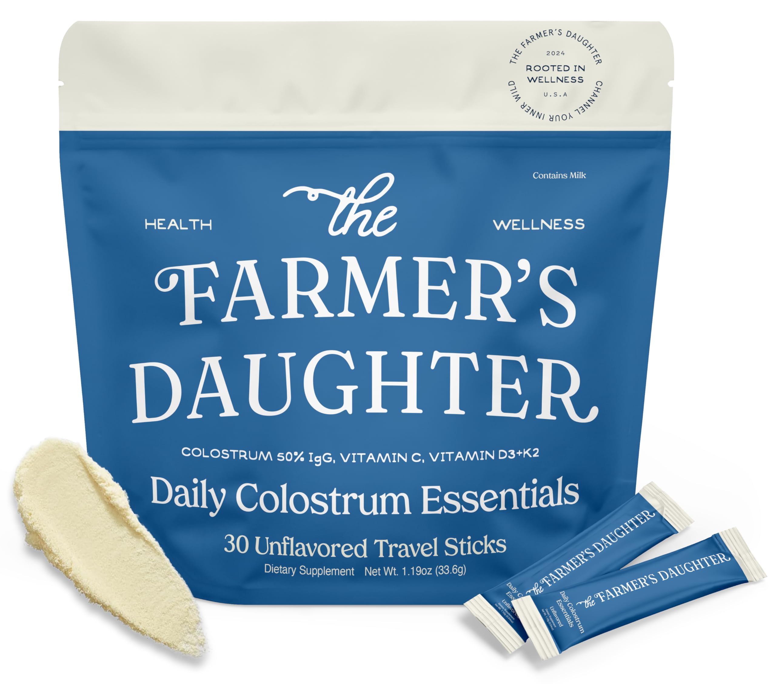 The Farmer's Daughter Daily Colostrum Essentials packaging with two travel sticks on a white background