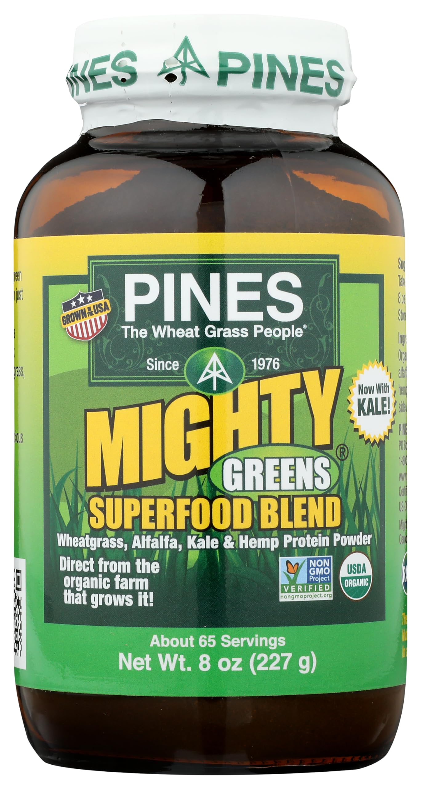 Bottle of Pines Mighty Greens Superfood Blend with green label and brown container.