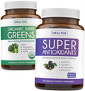 Two dietary supplement bottles labeled 'Super Greens' and 'Super Antioxidants' on a white background.