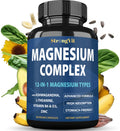 Bottle of StrongVit Magnesium Complex supplement with health benefits listed, surrounded by health foods.